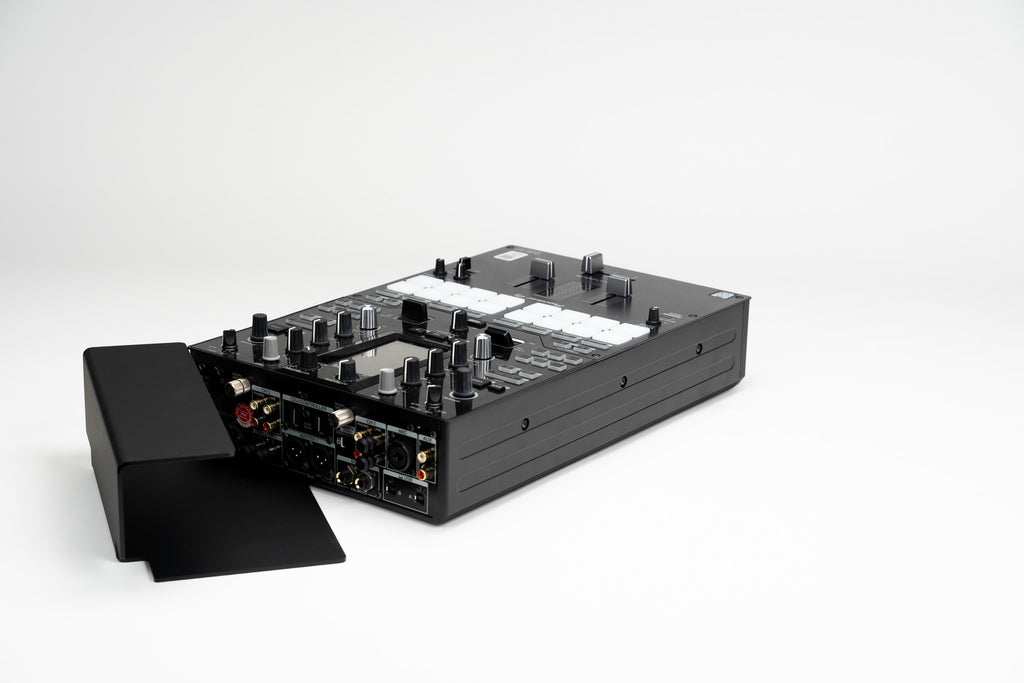Zero Cable cable cover next to a Pioneer DJM-S11 battle mixer before mounting