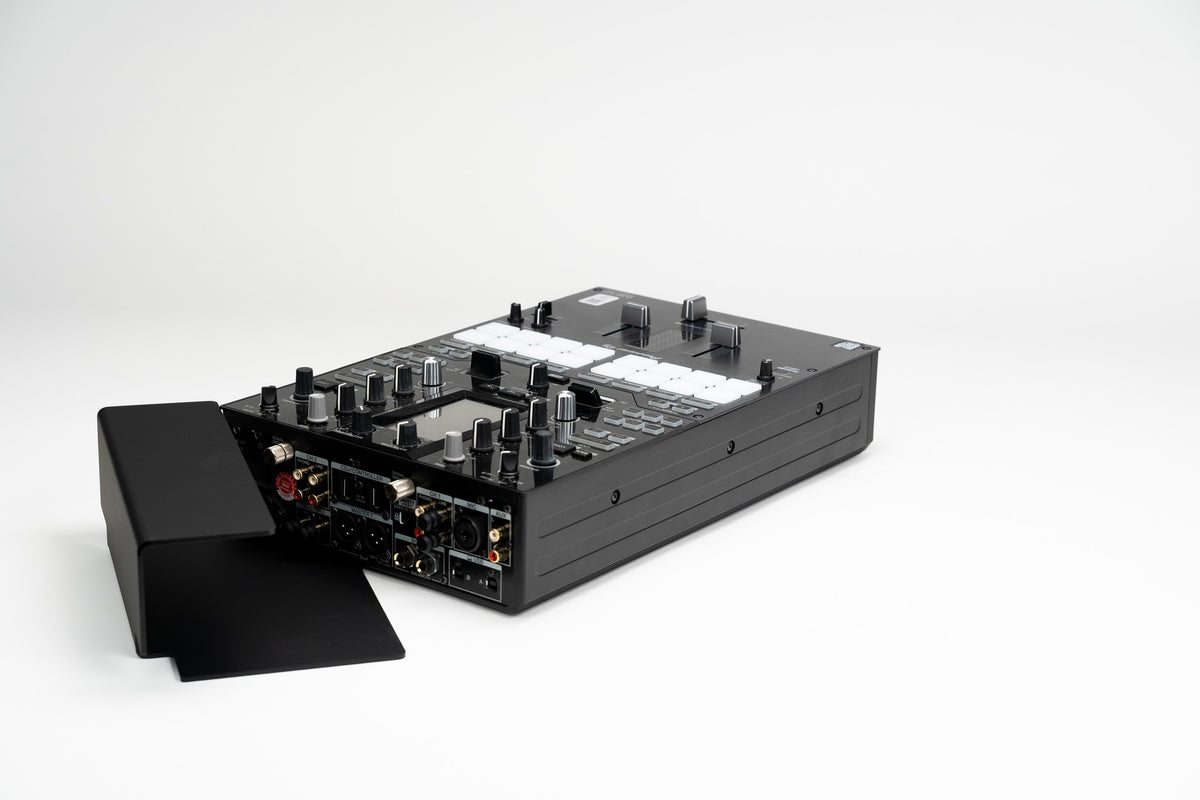 Zero Cable cable cover next to a Pioneer DJM-S11 battle mixer before mounting