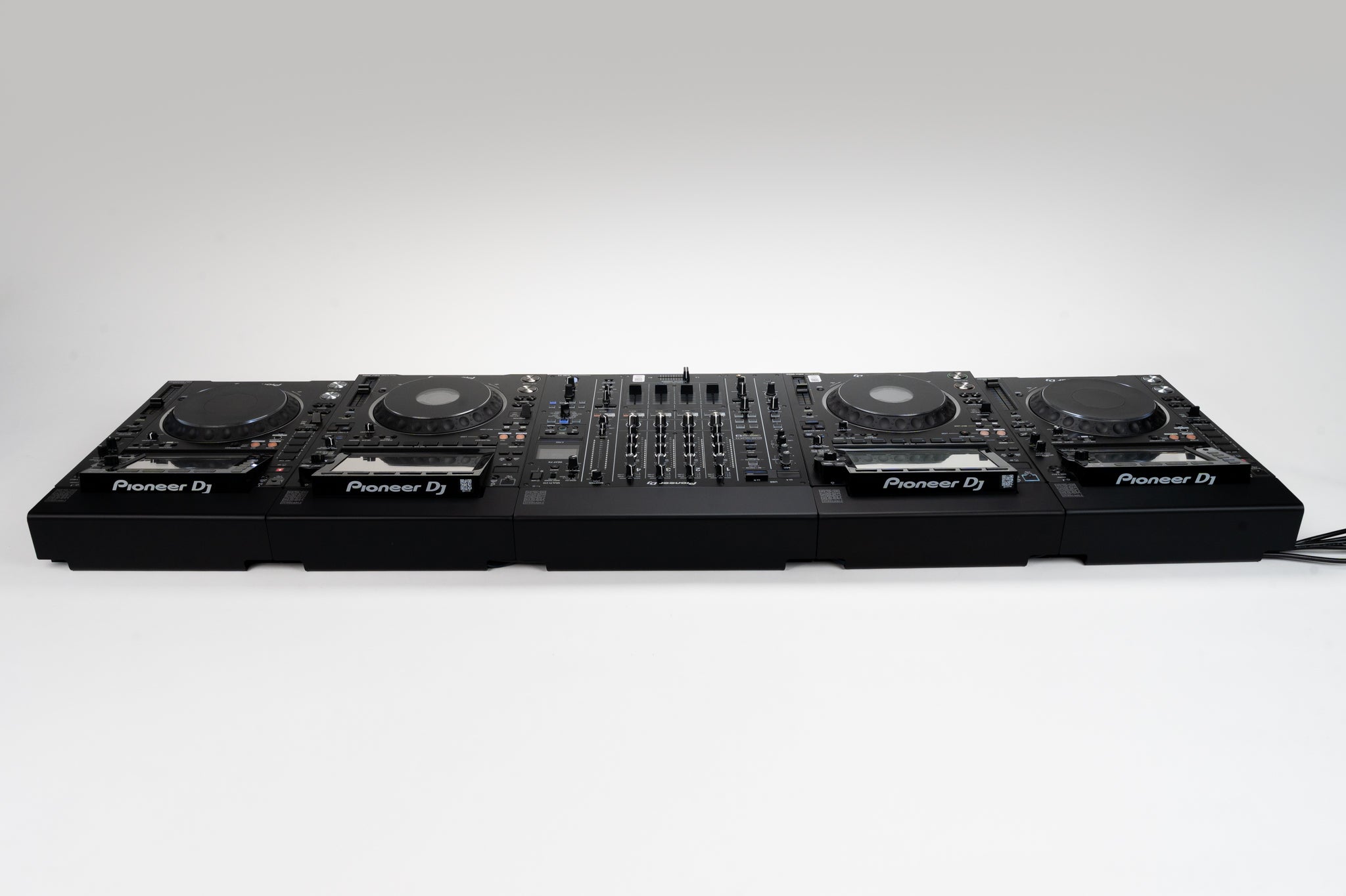 Pioneer CDJ-2000 & CDJ-3000 with DJM-A9 cable covers in a clean DJ booth setup