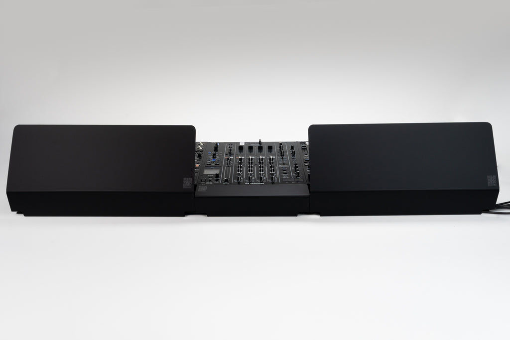 Clean DJ booth with Pioneer DJM-A9 and cable covers